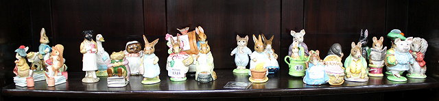 Appraisal: A LARGE QUANTITY OF PETER RABBIT BESWICK FIGURES approximately twenty