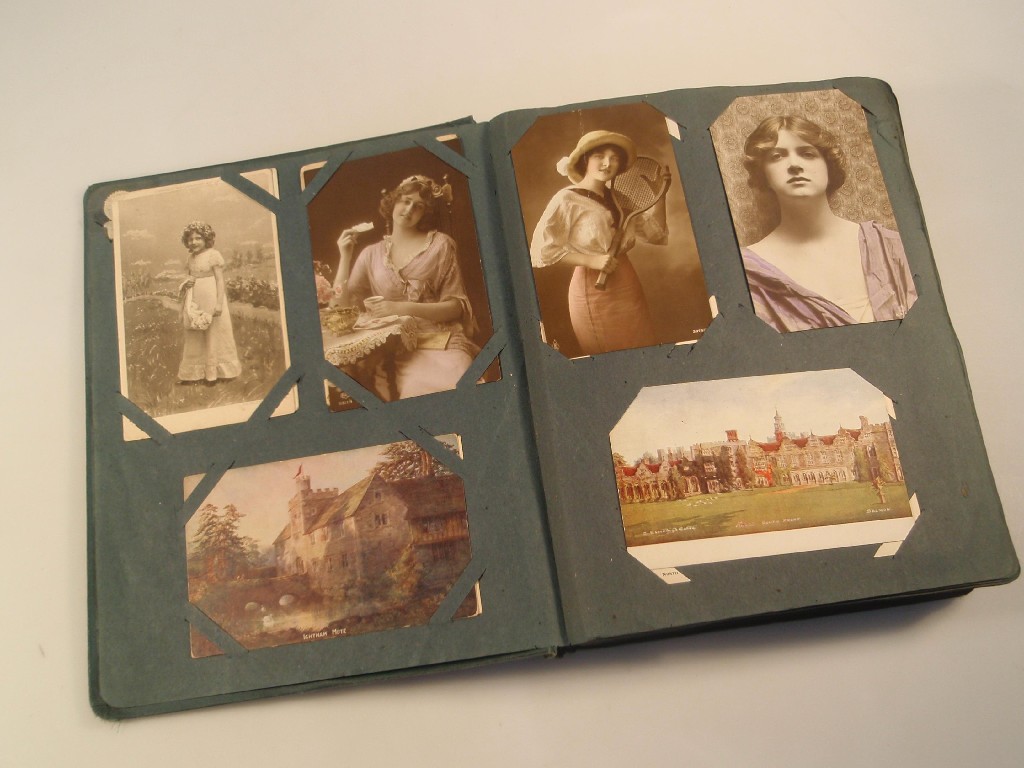 Appraisal: An early thC postcard album containing approximately postcards including GB