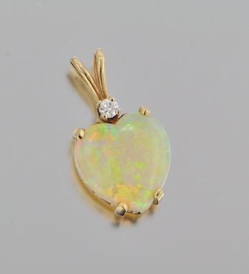 Appraisal: A White Opal and Diamond Pendant k yellow gold pendant