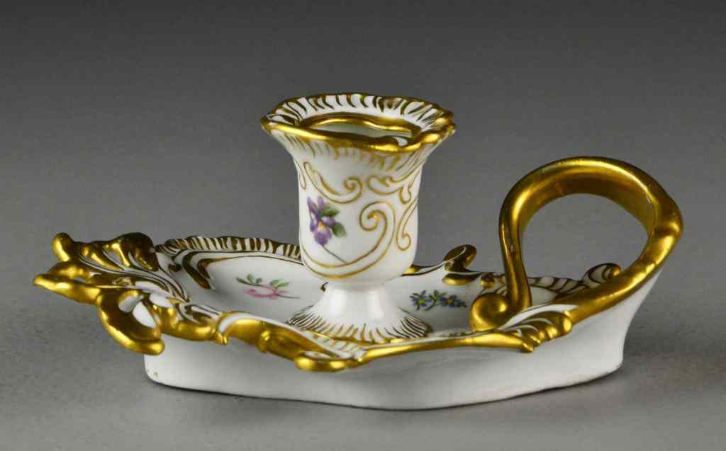 Appraisal: Dresden Porcelain Gilt ChamberstickReticulated gilt porcelain candleholder with scrollwork and