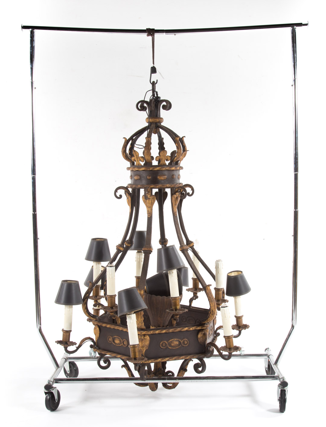 Appraisal: Continental style wrought iron and tole chandelier large -light hanging