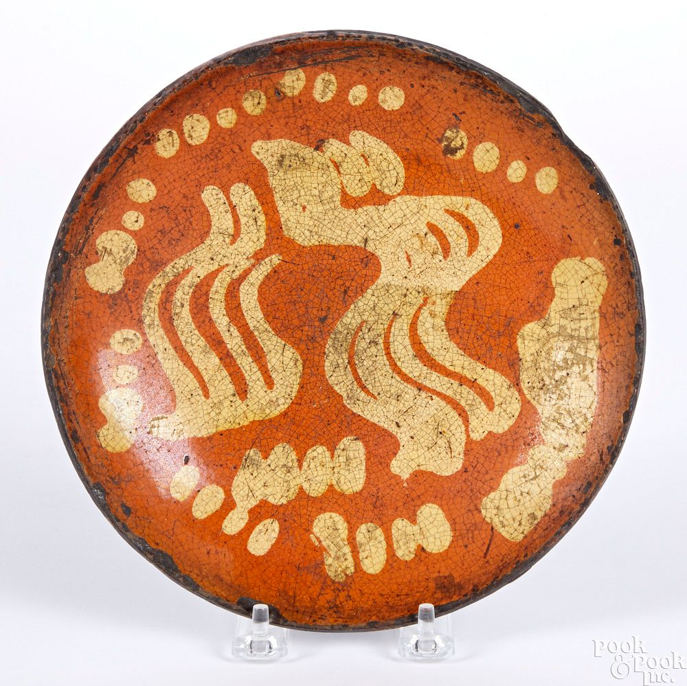 Appraisal: Pennsylvania redware pie plate Pennsylvania redware pie plate th c