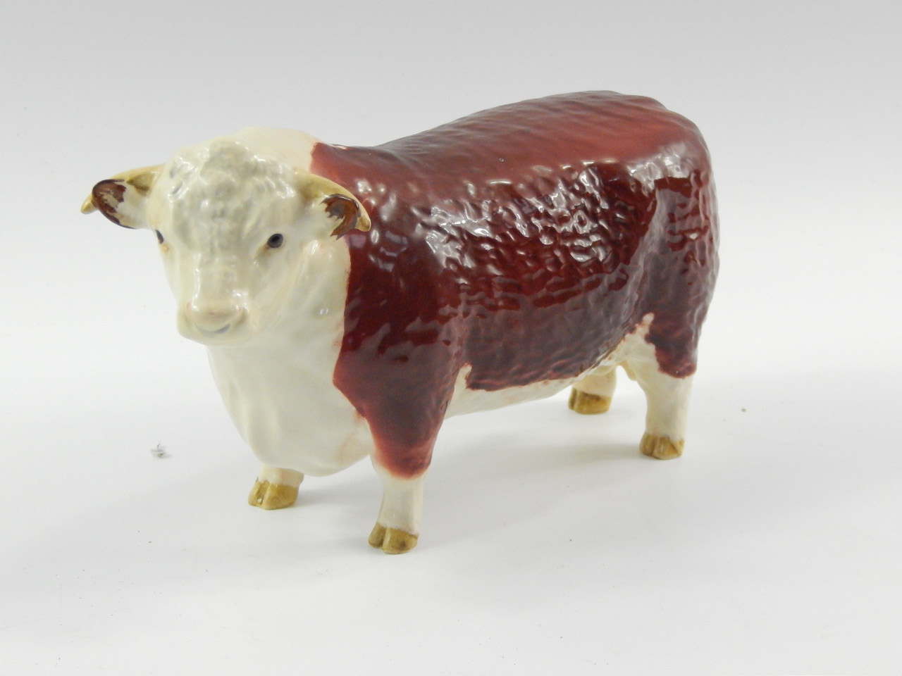 Appraisal: A Beswick figure of a Hereford Bull Champion of Champions