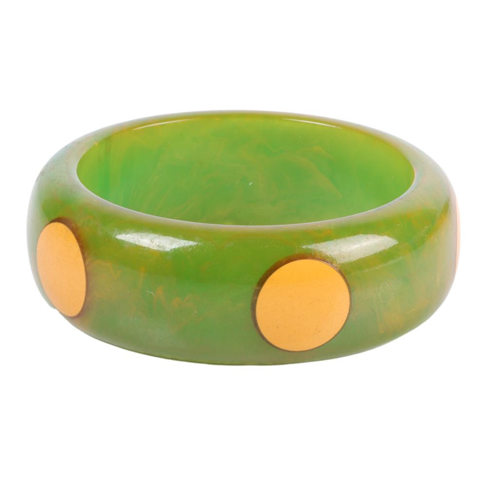 Appraisal: LARGE GREEN AND CREAM FIVE DOT BAKELITE BRACELET INNER DIAM