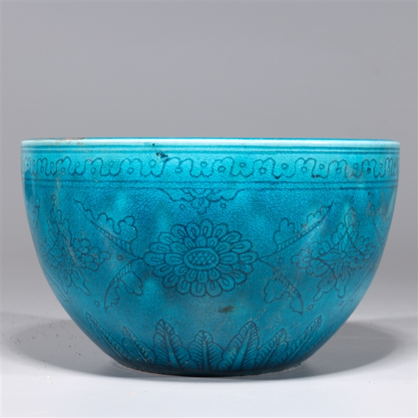 Appraisal: Chinese blue glazed porcelain bowl with allover floral designs to