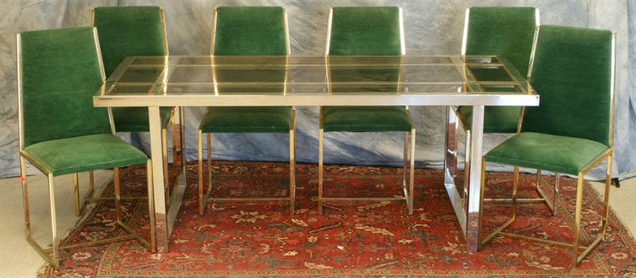 Appraisal: Vladimir Kagan stainless steel and smoked glass DR table with