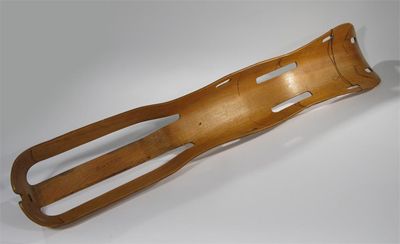 Appraisal: A moulded plywood leg splint designed by Charles Ray Eames