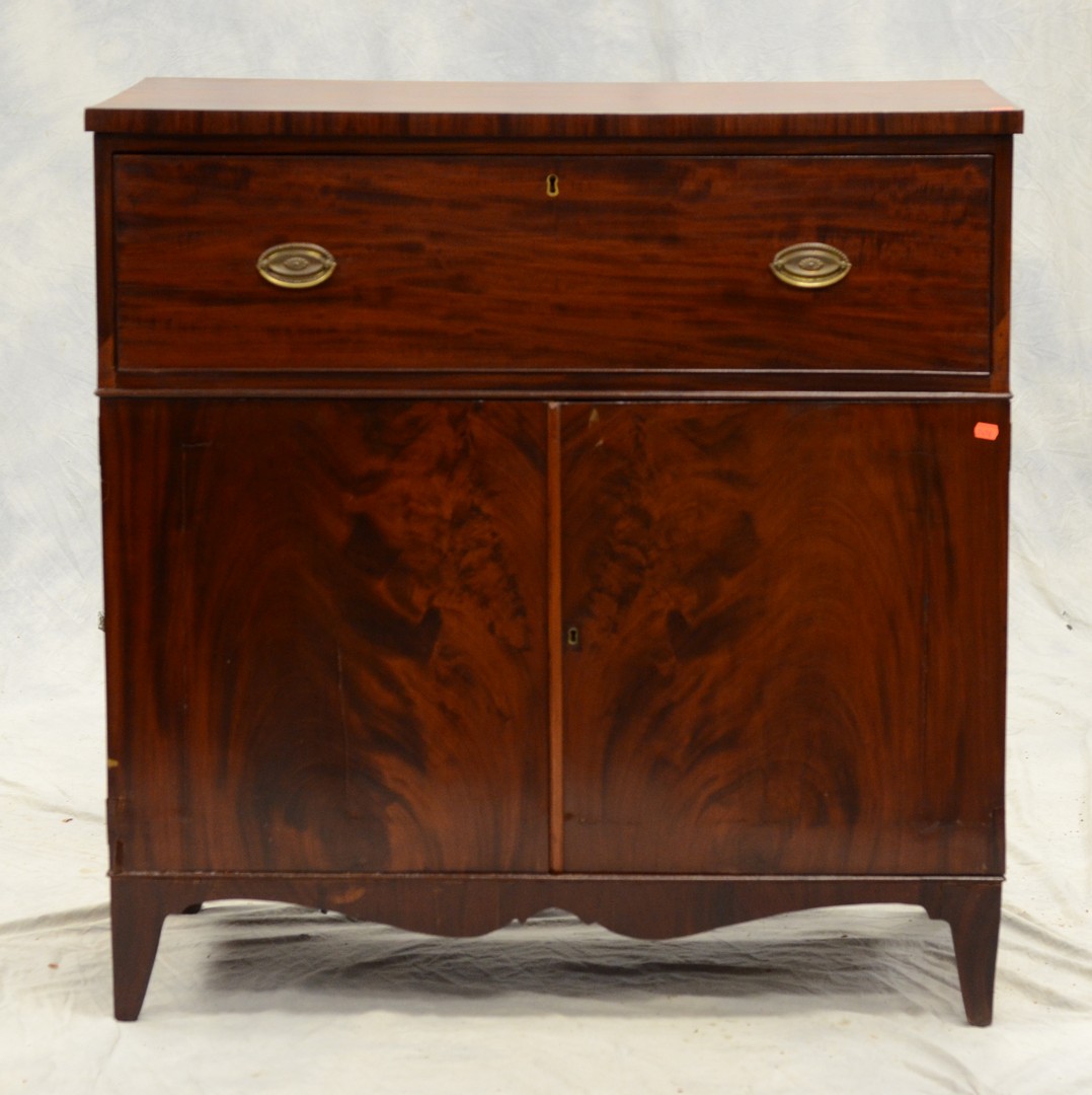 Appraisal: Mahogany butlers desk fall front desk over cupboard doors replaced