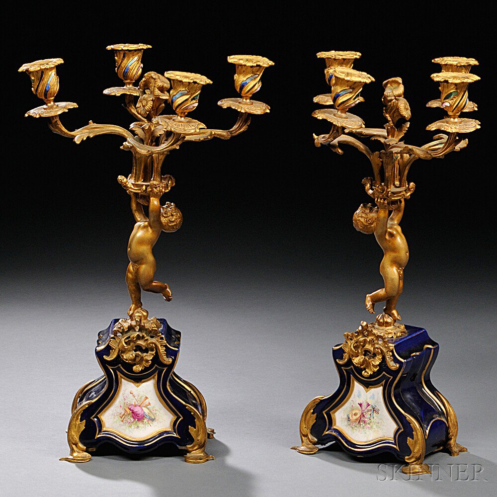 Appraisal: Pair of Porcelain-mounted Four-light Bronze Candelabra France th century each