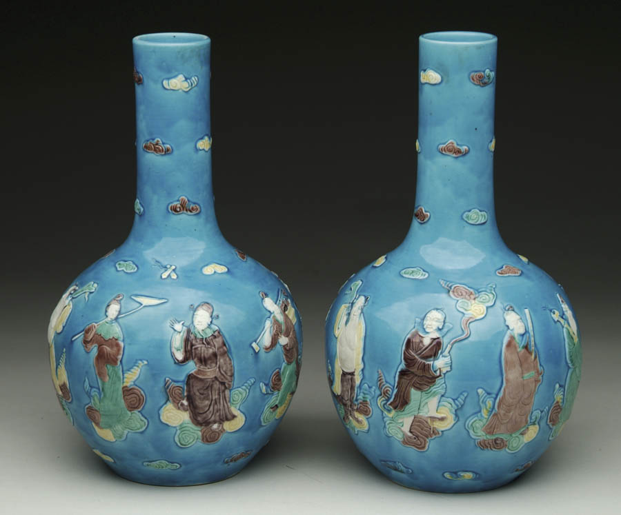 Appraisal: PAIR OF ORIENTAL DECORATED BLUE VASES The porcelain vases are