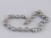 Appraisal: A grey South Sea cultured pearl necklace with a white