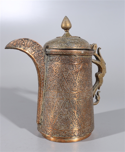 Appraisal: Indian teapot with incised floral designs throughout anamalistic handle thin