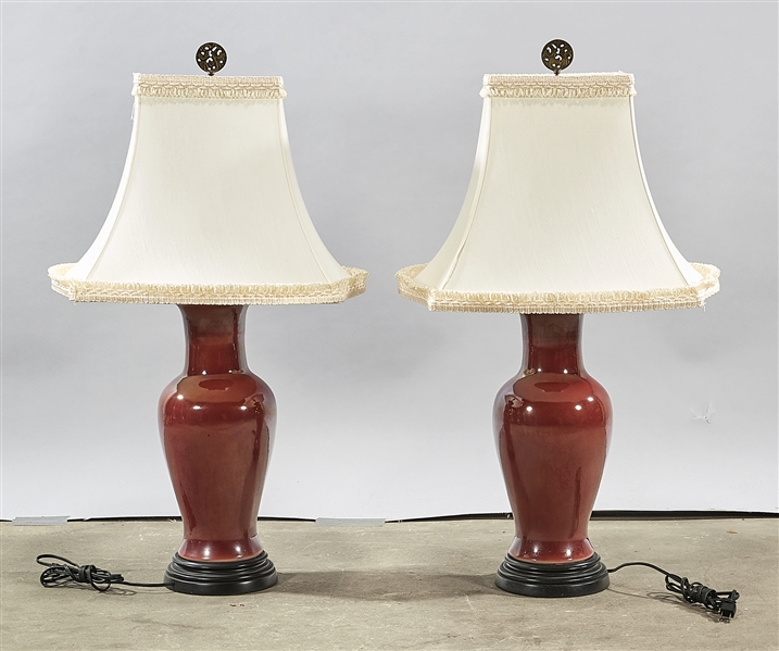 Appraisal: Pair of Chinese oxblood vase-form lamps x overall each approx