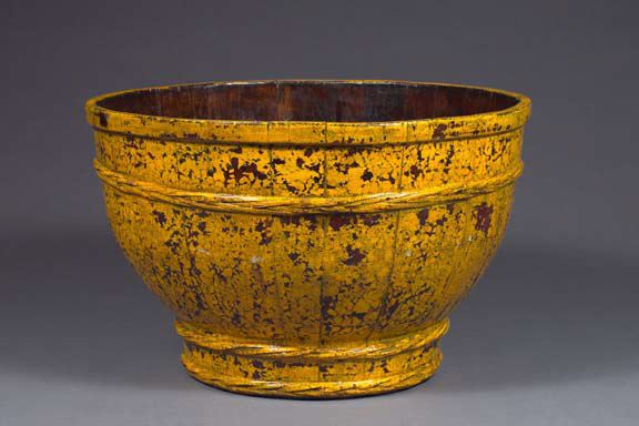 Appraisal: Monumental Provincial Staved Treen Bowl in weathered yellow paint fourth