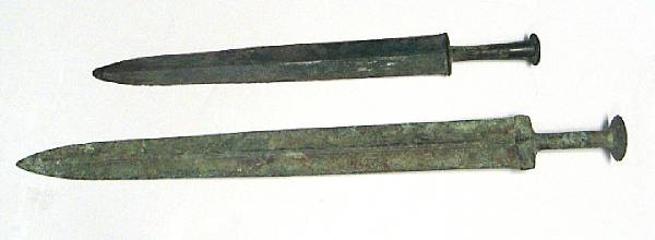 Appraisal: Two bronze double edged swords Han Dynasty Each similarly cast