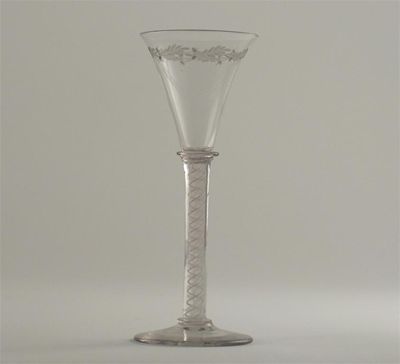 Appraisal: A wine glass the bowl engraved with a border of