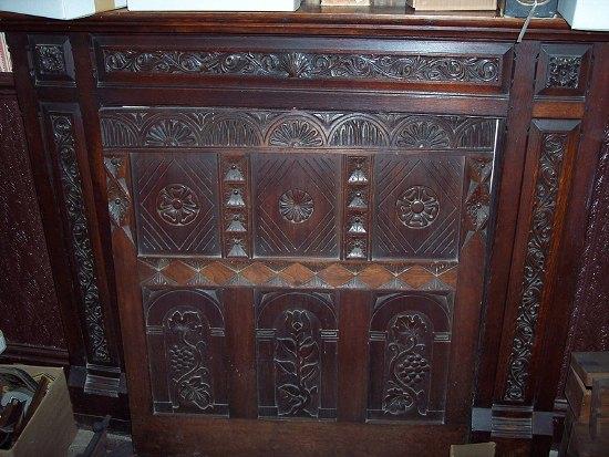 Appraisal: A carved oak fire surround cm wide a carved panel