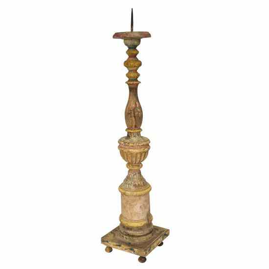 Appraisal: An Indo-Portuguese Painted Teak Candlestick having a broad drip pan