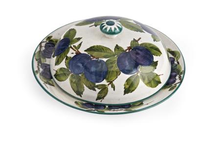 Appraisal: WEMYSS MUFFIN DISH AND COVER CIRCA decorated with plums painted