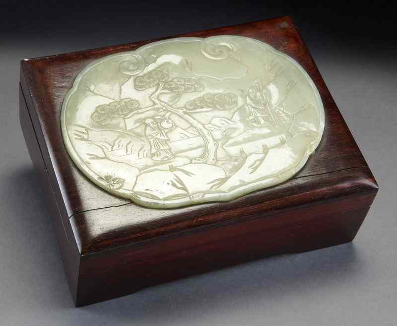 Appraisal: Chinese Qing jade plaque depicting figuresin a landscape mounted on