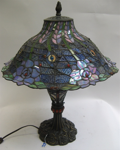 Appraisal: A DECORATIVE STAINED AND LEADED GLASS TABLE LAMP The in