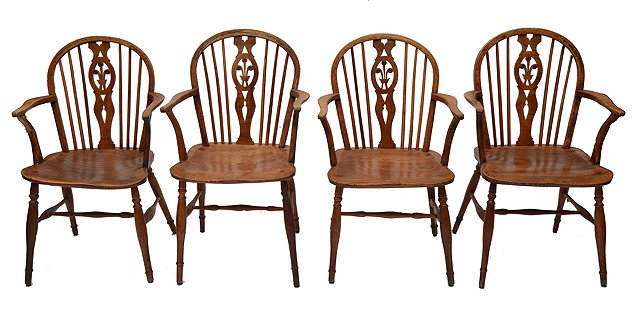 Appraisal: A SET OF FOUR ANTIQUE ASH ELM AND FRUITWOOD WINDSOR