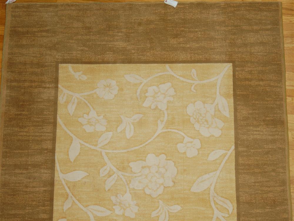 Appraisal: ERDENT MONGOLIAN WOOL RUG having a plain wide tan border