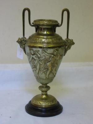 Appraisal: A VICTORIAN CAST BRASS URN with raised beaded loop handles