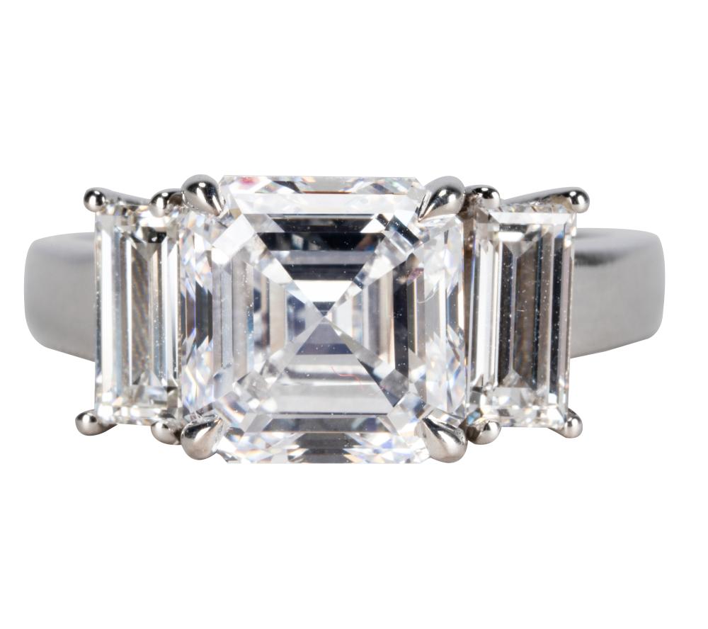 Appraisal: KARAT WHITE GOLD DIAMOND RINGcentering one square emerald cut diamond