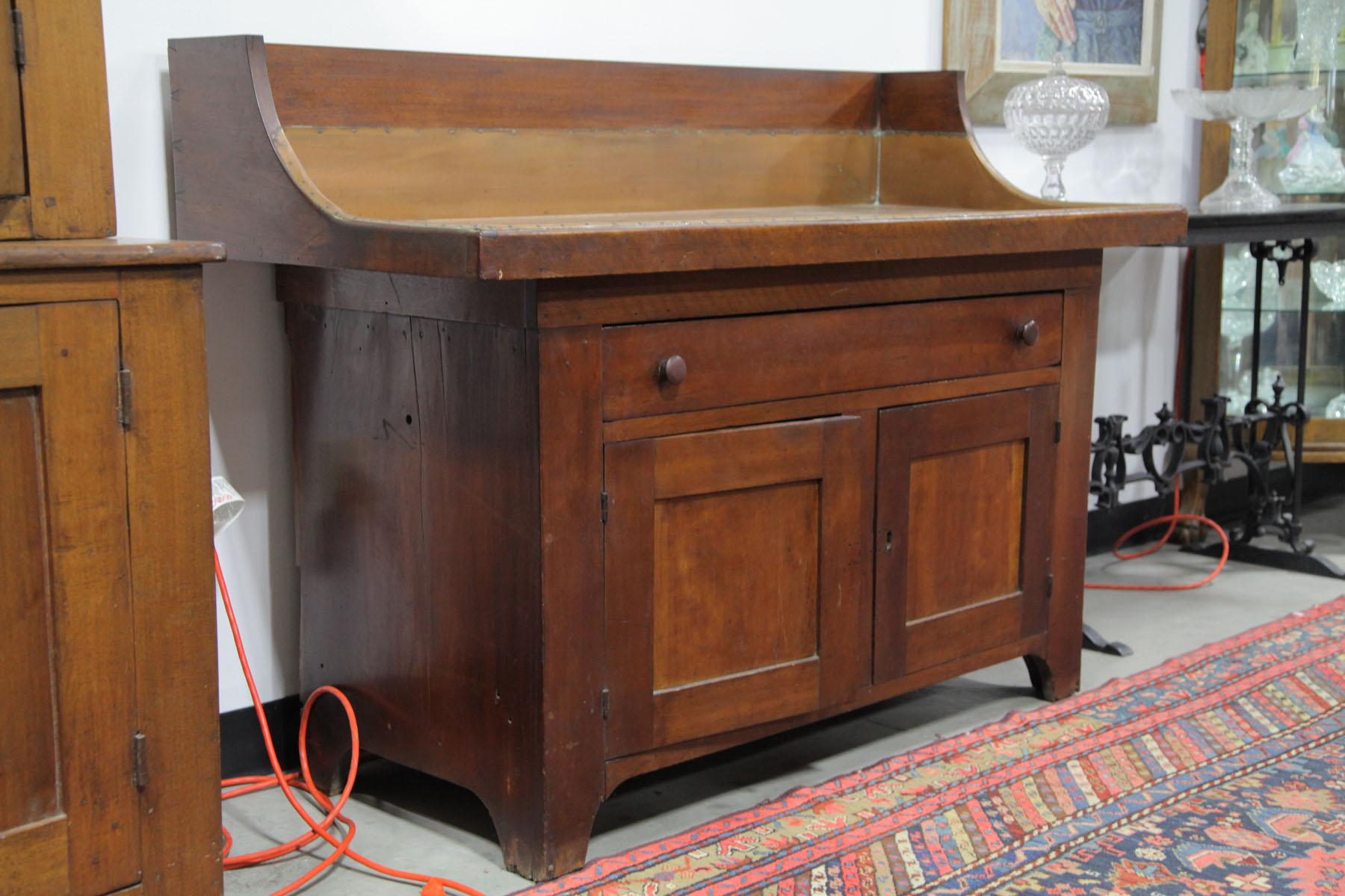 Appraisal: DRY SINK American late th century walnut and cherry Shaped