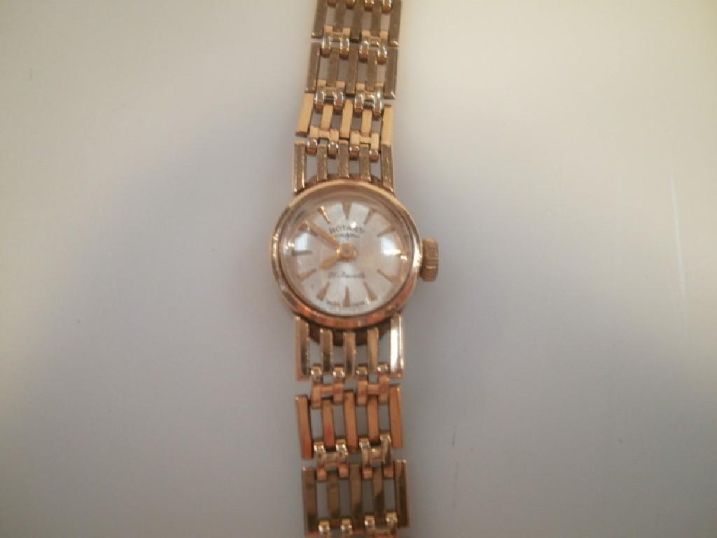 Appraisal: A ladies Rotary gold cased wristwatch on ct gold bracelet