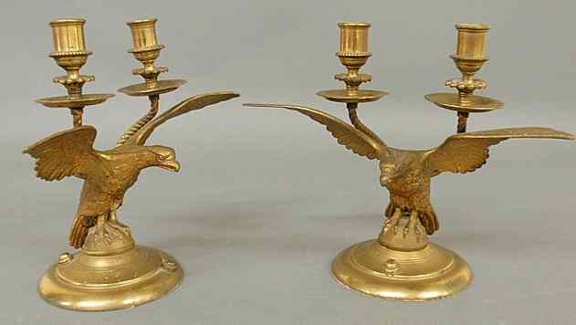 Appraisal: Pair of brass spread winged eagle candlesticks early th c