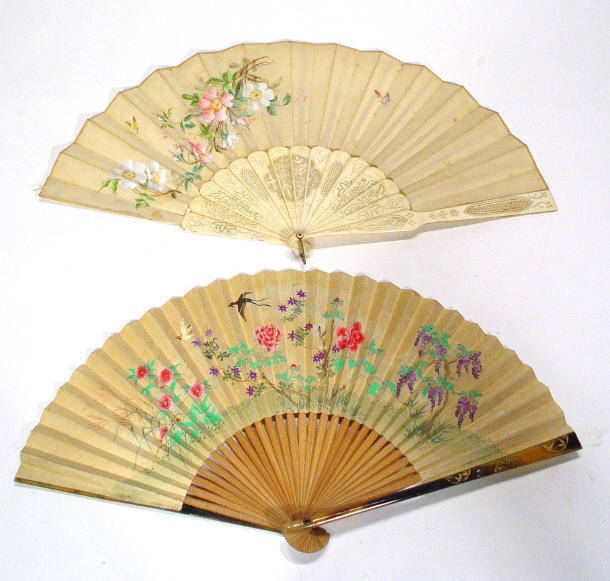 Appraisal: Oriental fan with tortoiseshell simulated bamboo guard sticks gilded with