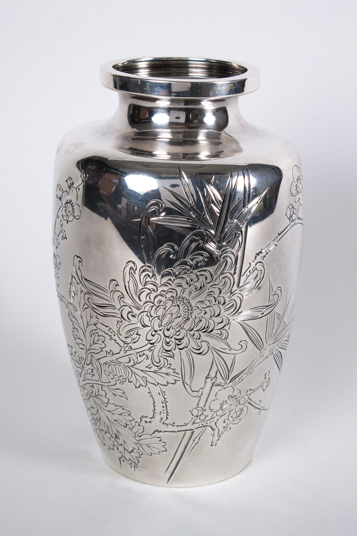 Appraisal: Japanese engraved silver vase in H ozt