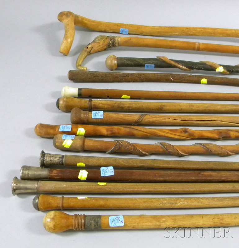 Appraisal: Fourteen Carved Wooden Walking Sticks including commemorative silver mounted