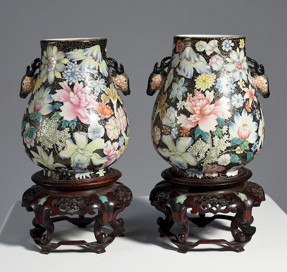 Appraisal: Pair Chinese Famille Noire floral decorated Hu vases Pair Chinese