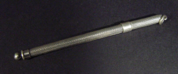 Appraisal: Propelling silver cocktail stirrer with engine turned barrel Birmingham