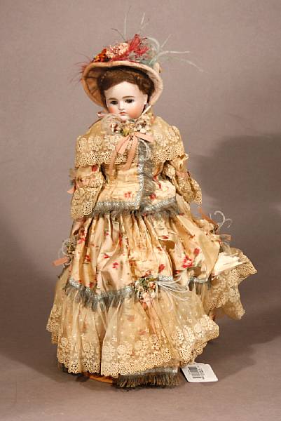 Appraisal: A German bisque turned head doll the shoulder head doll