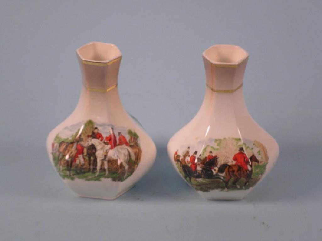 Appraisal: A pair of Royal Worcester Palissy bottle shaped vases each