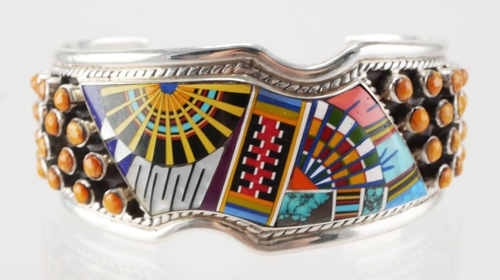 Appraisal: Sterling silver cuff bracelet featuring Native American style multi-colored design