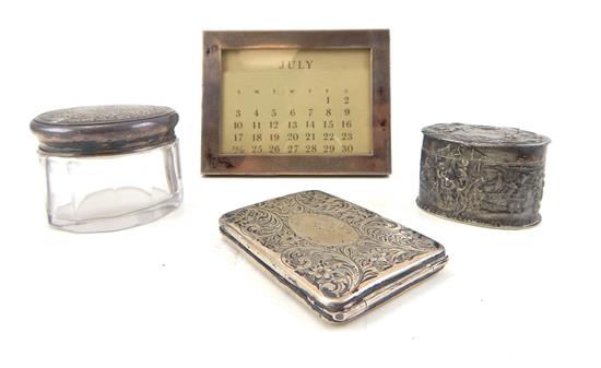 Appraisal: SILVER Four pieces sterling silver Tiffany Co framed calendar simple