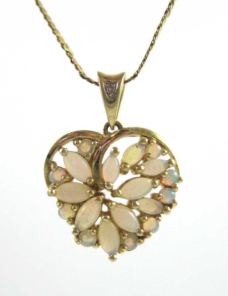 Appraisal: OPAL AND FOURTEEN KARAT GOLD PENDANT NECKLACE with a -