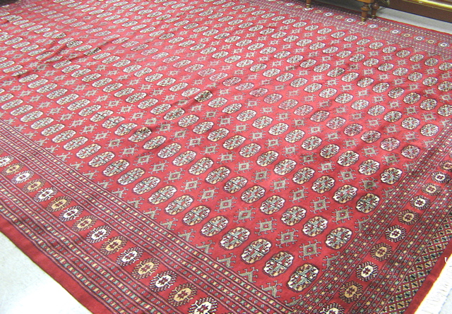 Appraisal: PAKISTANI BOKHARA CARPET overall geometric Turkoman gol design arranged in