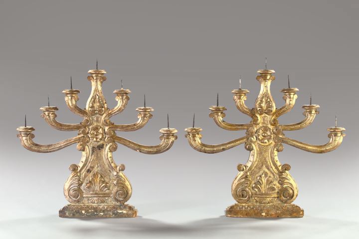 Appraisal: Large Pair of Italian Provincial Carved and Silver-Leafed Wooden Seven-Light