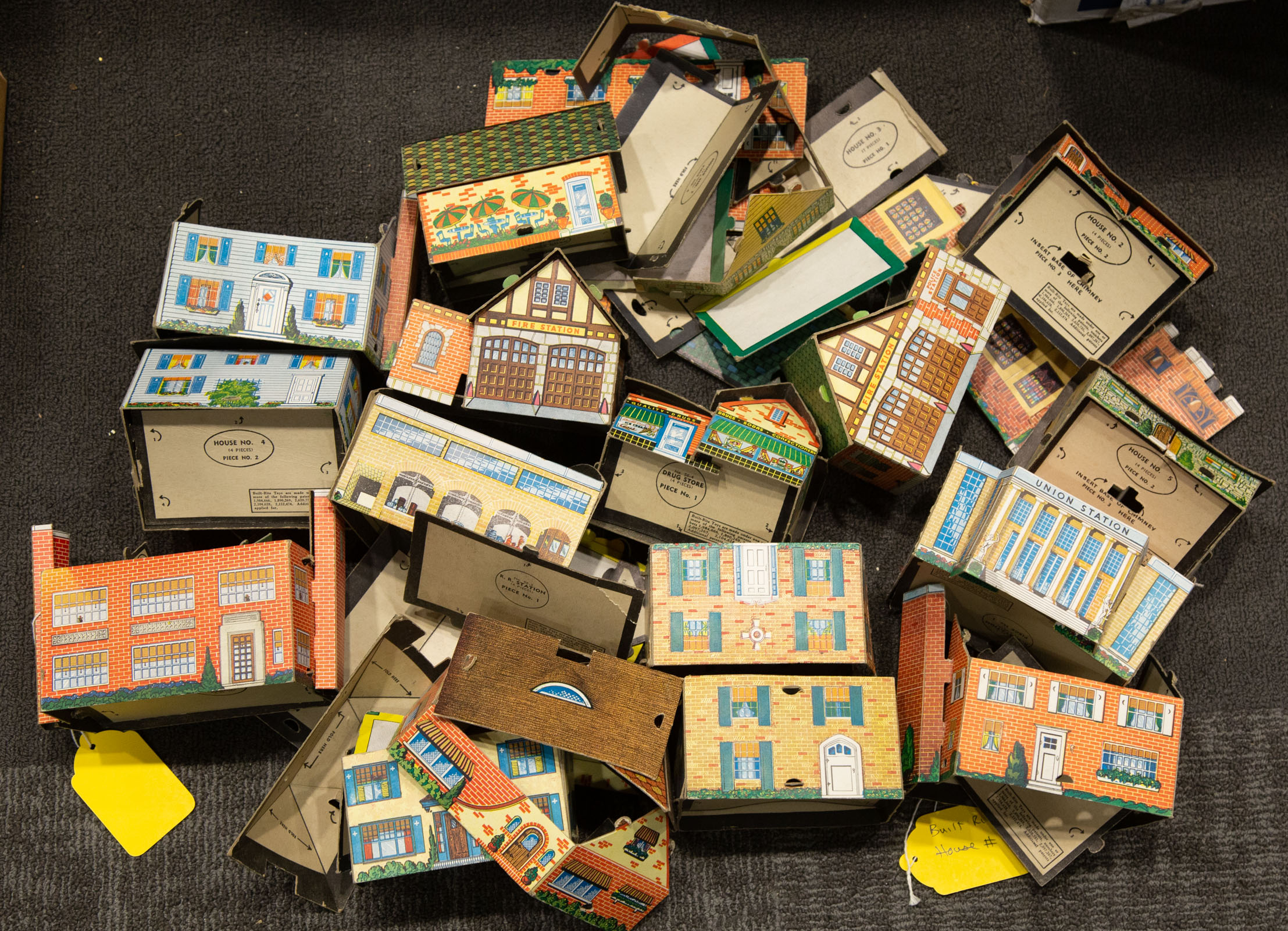 Appraisal: ASSORTMENT OF BUILT RITE CARDBOARD HOUSES Circa s printed cardboard