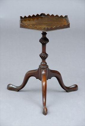 Appraisal: GEORGE III MAHOGANY WINE TABLE The hexagonal top with shaped