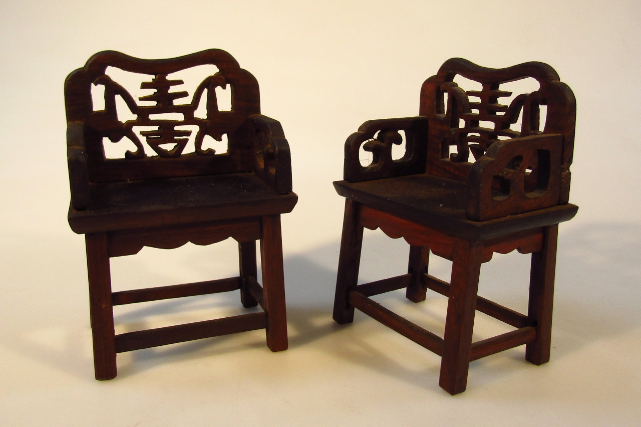 Appraisal: A pair of Chinese Qing period huanghuali miniature chairs each