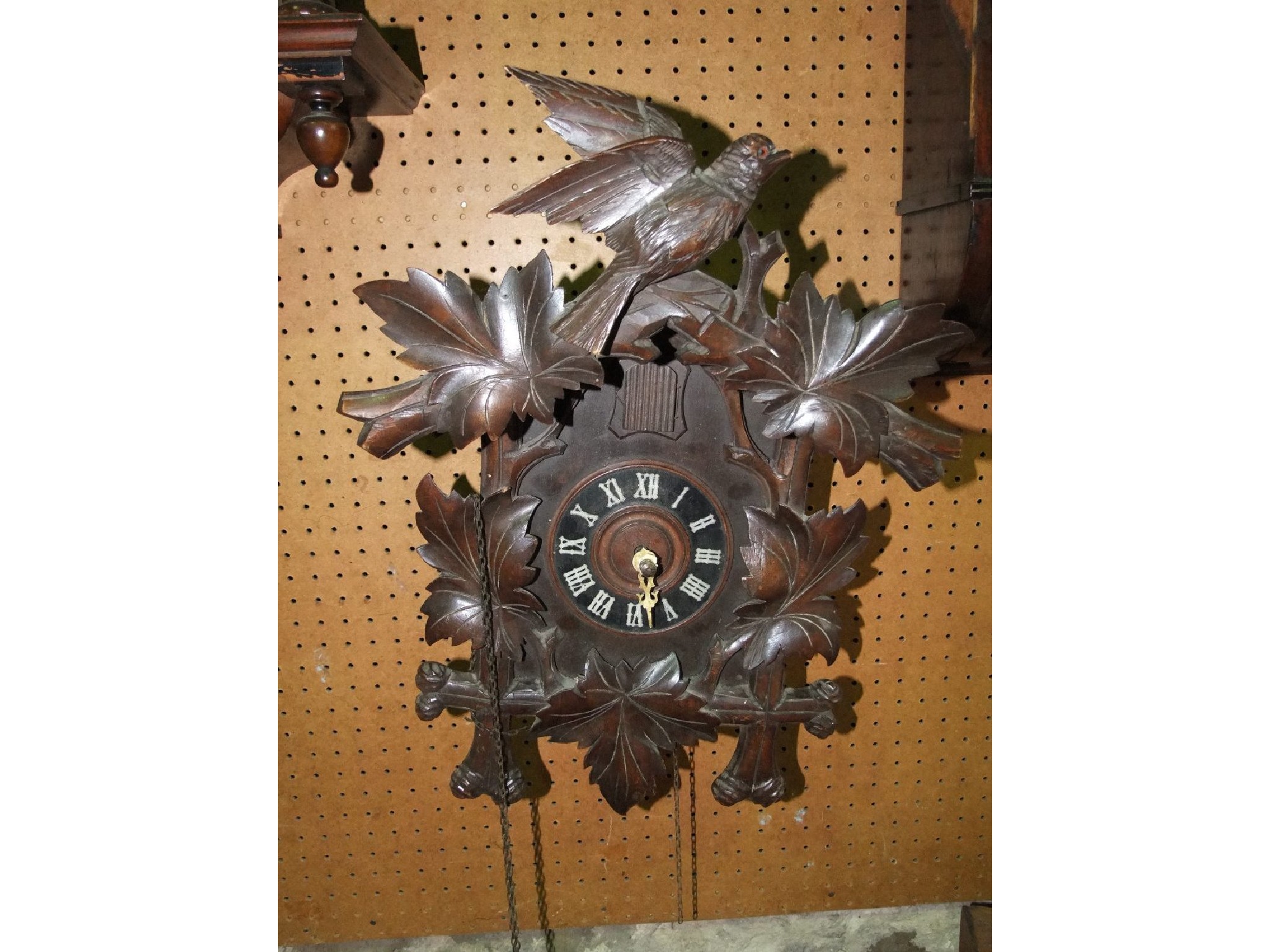 Appraisal: A Tyrolean cuckoo clock the case of chalet form with