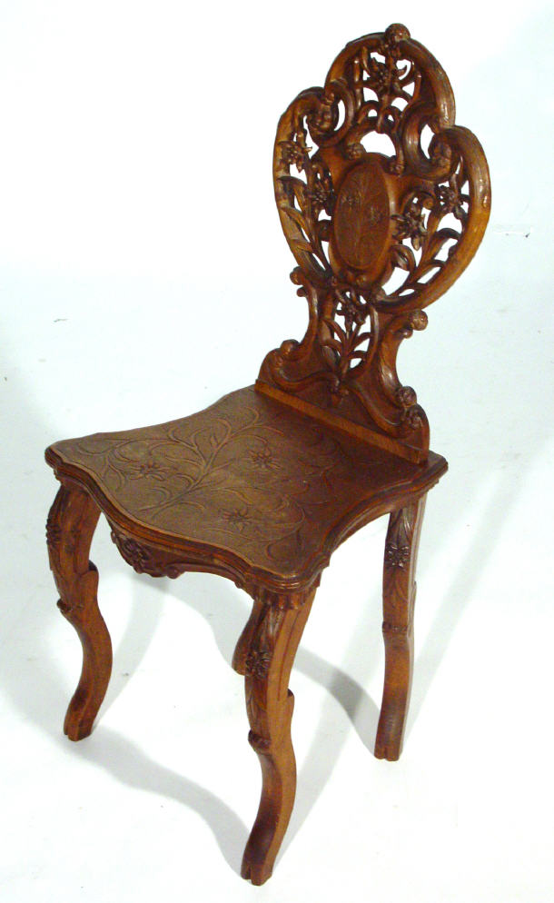 Appraisal: Victorian walnut hall chair with floral carved back and seats