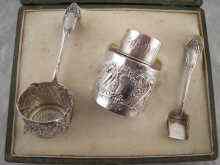 Appraisal: A continental silver tea serving set comprising caddy shovel and